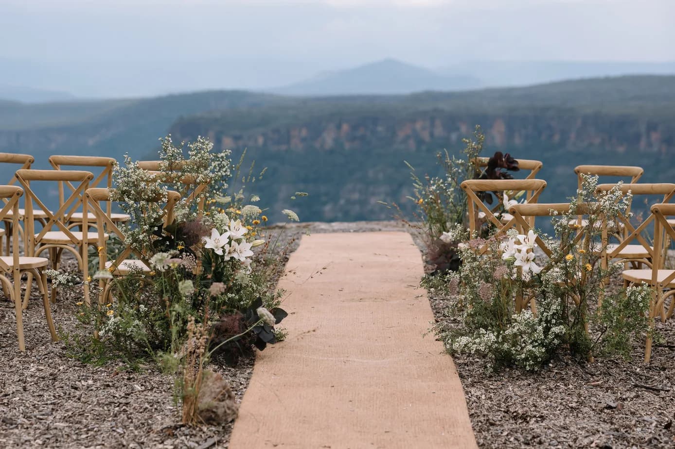Long jute aisle runner at the clifftop ceremony site