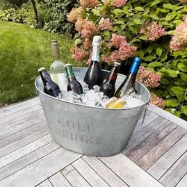 Silver drinks tub filled with ice and bottles
