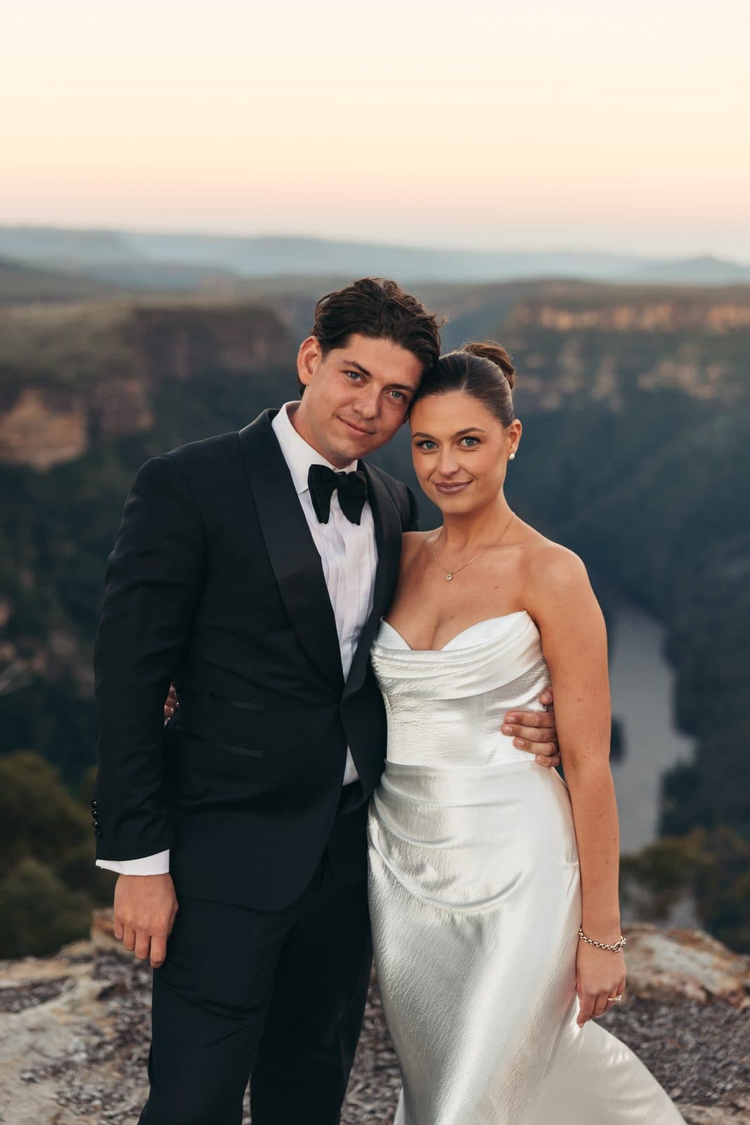 Liv and Ryan at The Cliffs at sunset, the gorge glowing behind them
