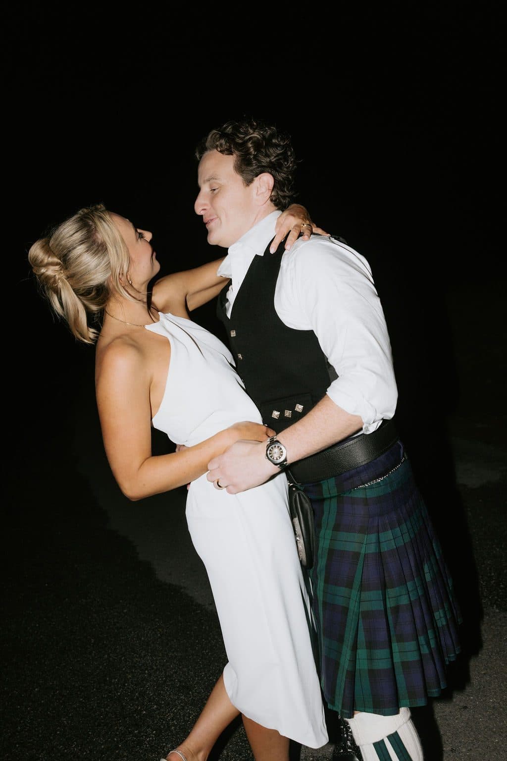 Anna and Calum dancing outside The Pavilion at night