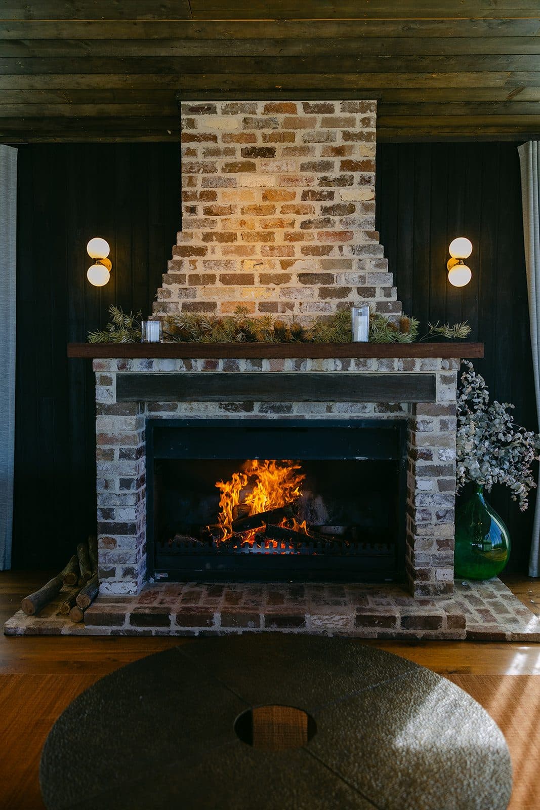 The Pavilion's brick fireplace lit for the evening