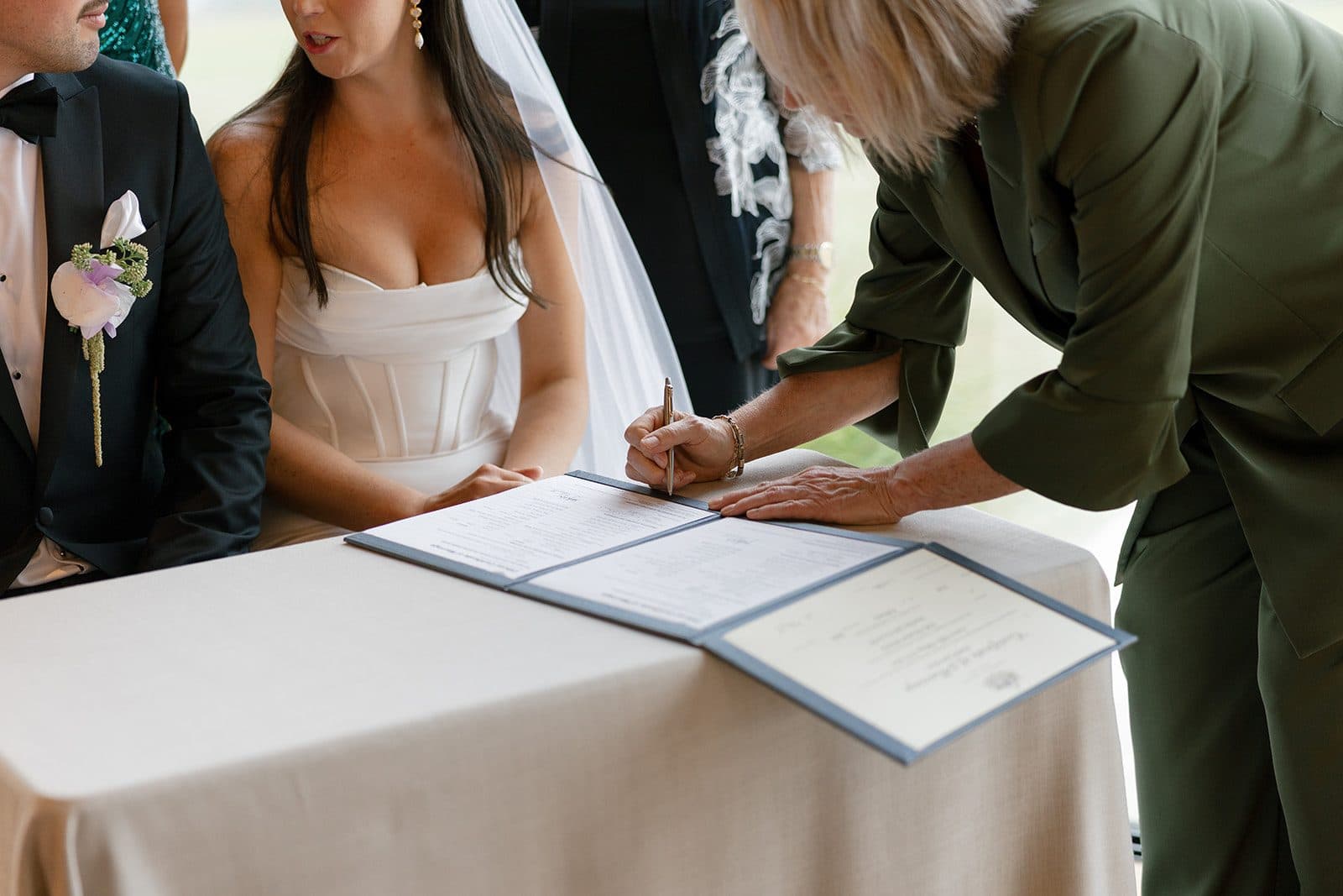 Matt and Holly signing the register